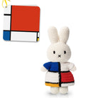 Crocheted Miffy rabbit wearing a Mondrian-style dress.