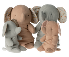 Here are some descriptive alt tags for the image:
*   Four plush elephant toys in beige and gray.
*   Two sets of mama and baby elephant stuffed animals.
*   Cute elephant plushies with patterned ear lining.
*   Beige and gray plush toy elephants.
*   Stack of plush elephants, various sizes.