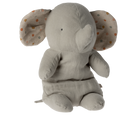 Gray stuffed elephant with polka dot ears, seated.
