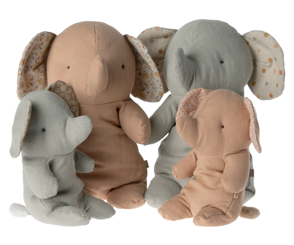 Four plush elephant toys in different sizes and colors.