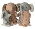 Four plush elephant toys in different sizes and colors.
