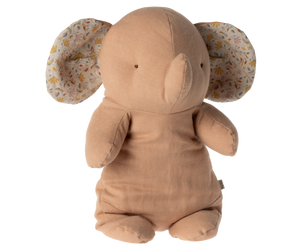 Here are a few descriptive alt tags for the image:
*   **Stuffed elephant with floral print ears.**
*   **Tan plush elephant toy.**
*   **Cute beige elephant doll.**