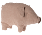 Stuffed brown pig with patterned fabric.