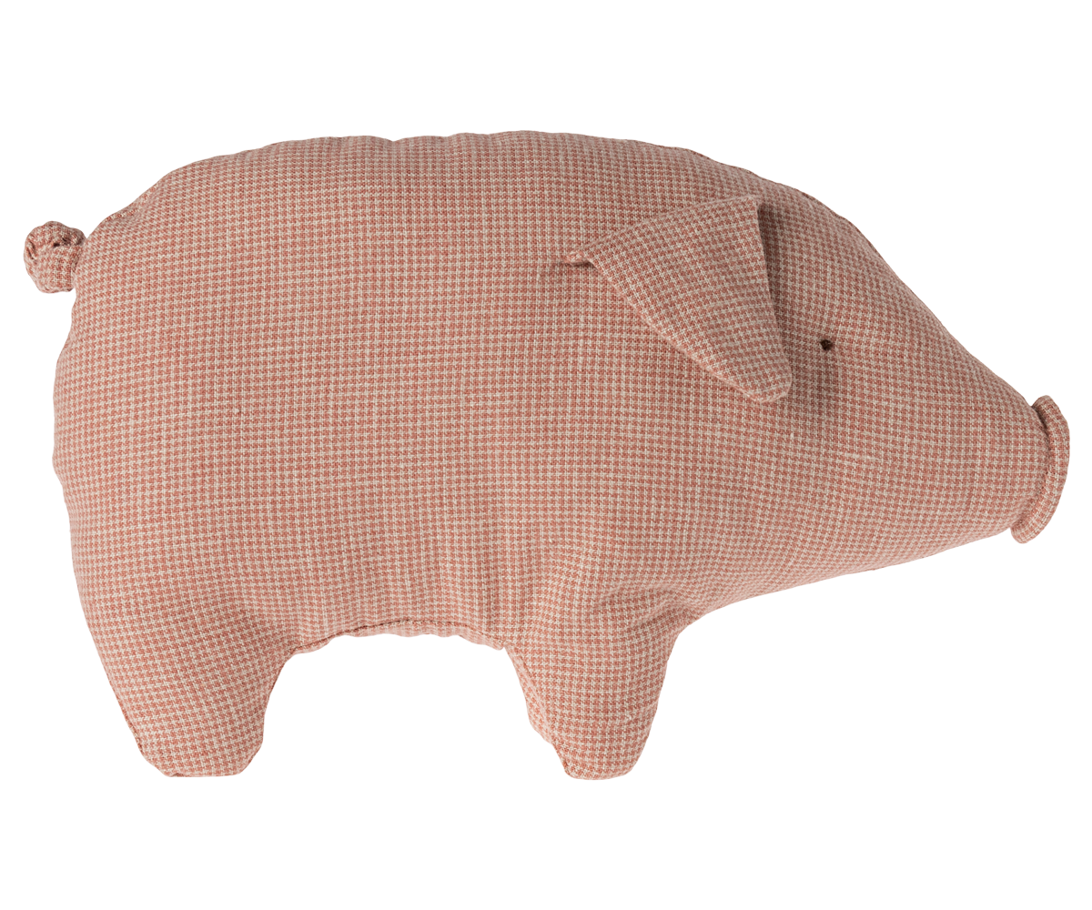 Stuffed pink pig toy.