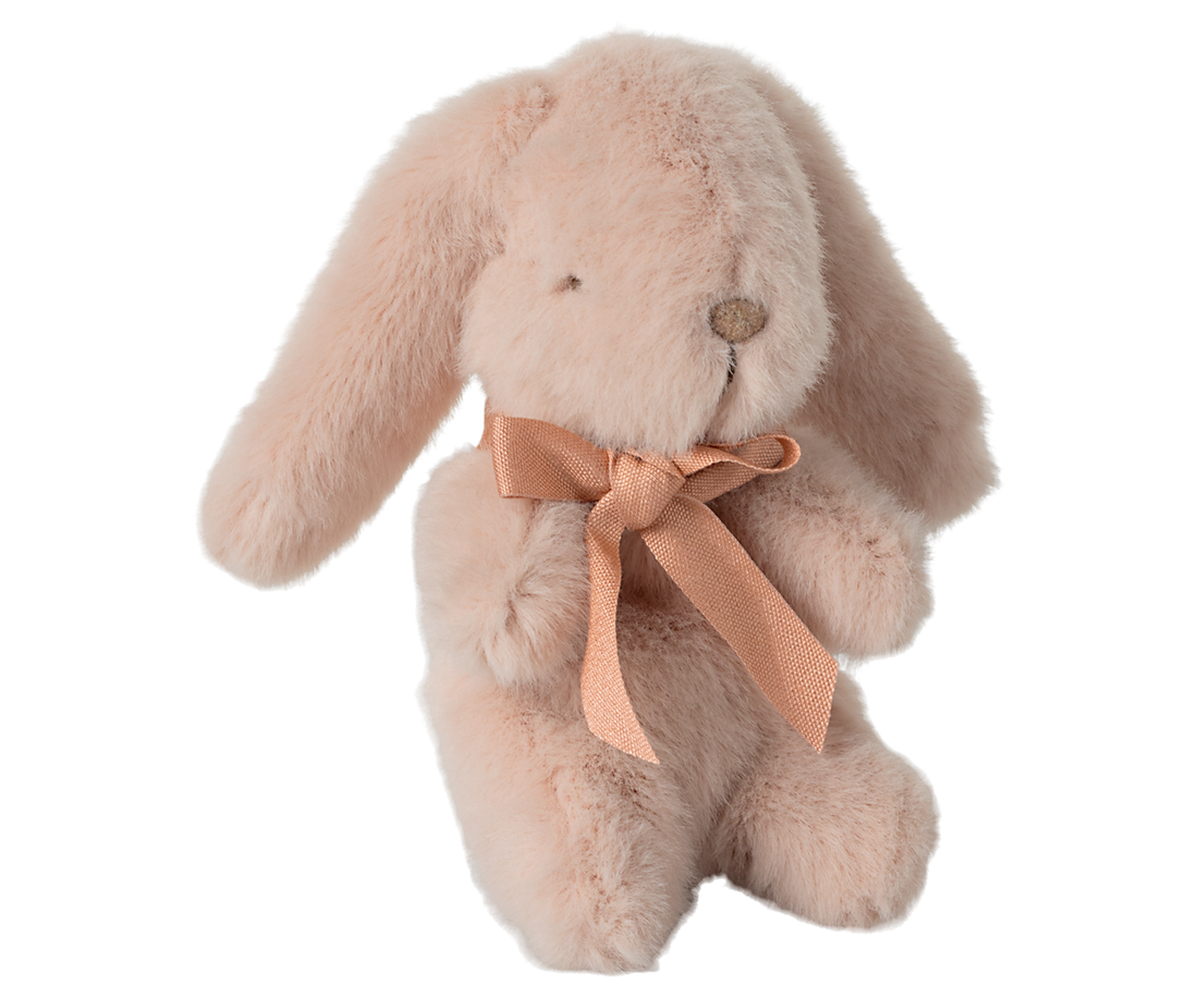 Pink plush bunny with ribbon.