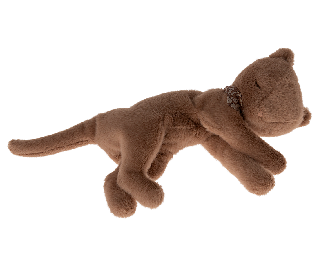 Brown plush toy cat with floral collar.