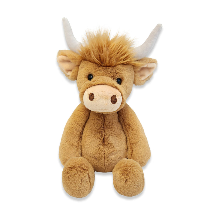 Brown plush highland cow toy with horns.