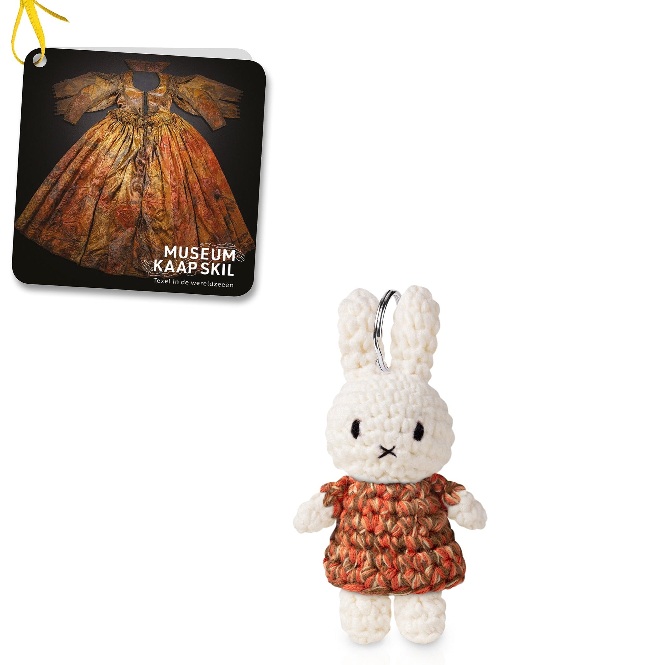 Crocheted Miffy bunny keychain with orange and brown dress.