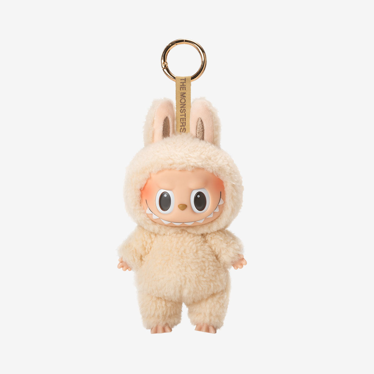 Plush keychain toy in a bunny suit.