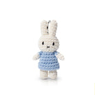 Crocheted Miffy keychain in blue dress.