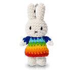 Crocheted white Miffy doll with rainbow dress.