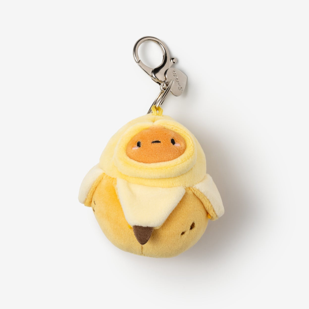 Plush keychain of a cartoon character in a yellow outfit on a white background