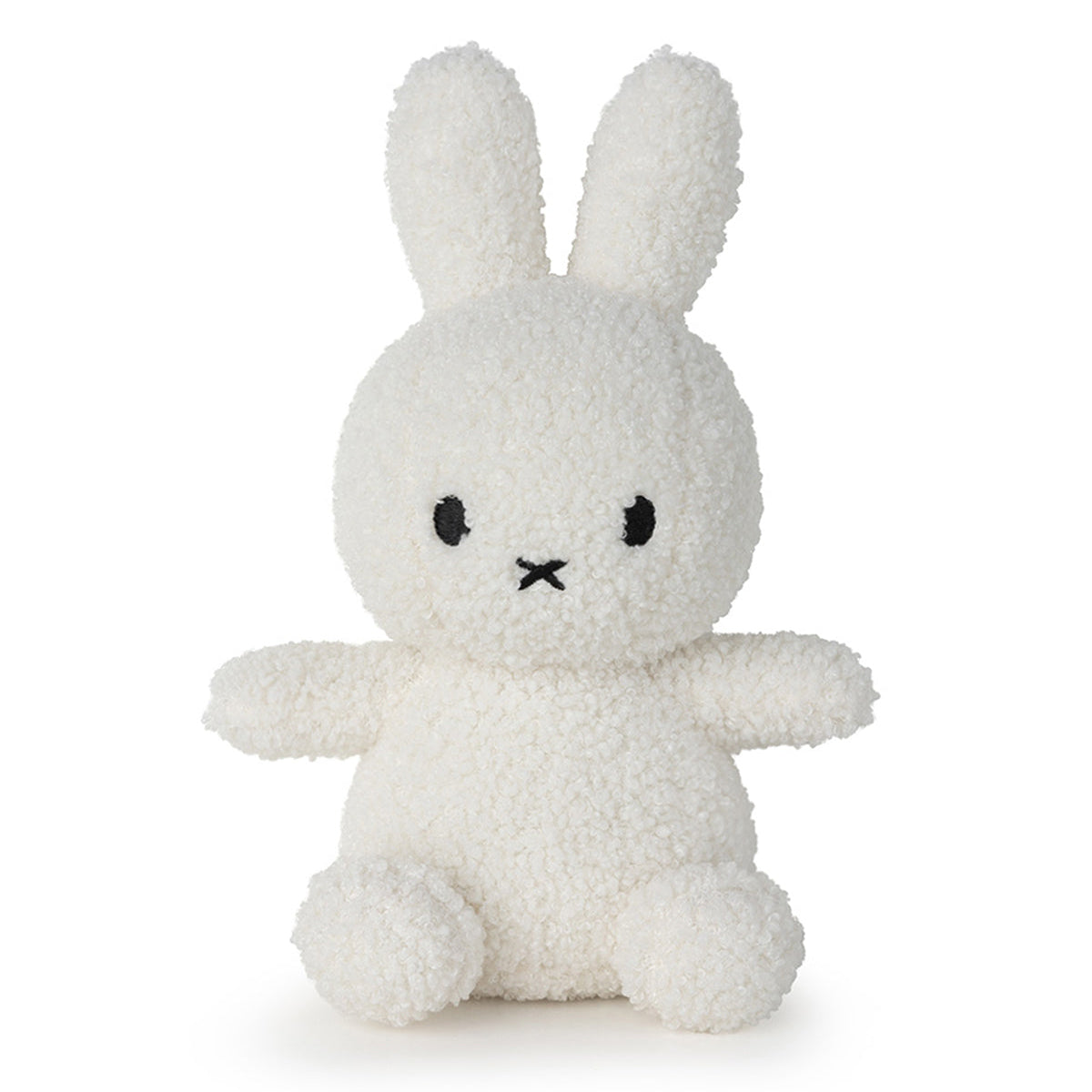 White stuffed Miffy bunny toy sitting.
