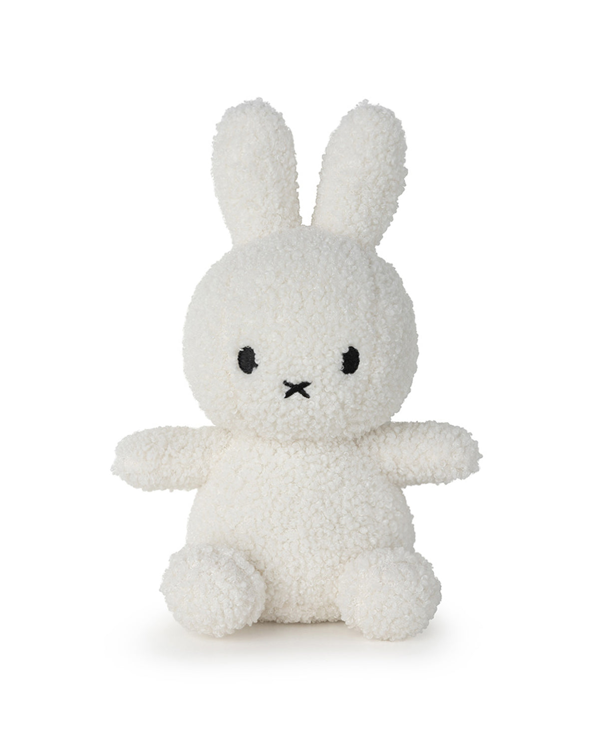 White stuffed Miffy bunny toy sitting.