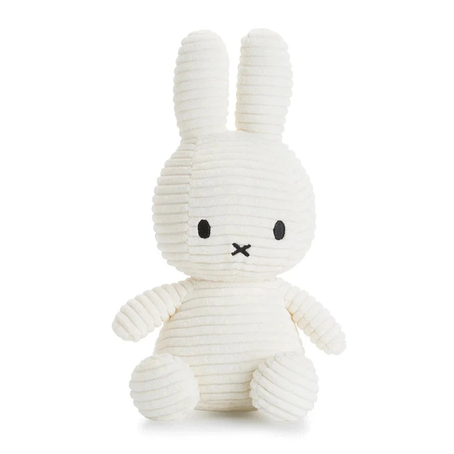 White corduroy Miffy bunny plush toy.