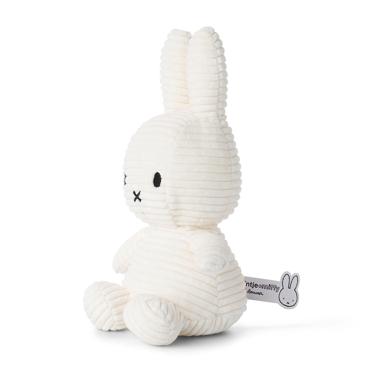 White corduroy Miffy plush toy sitting.