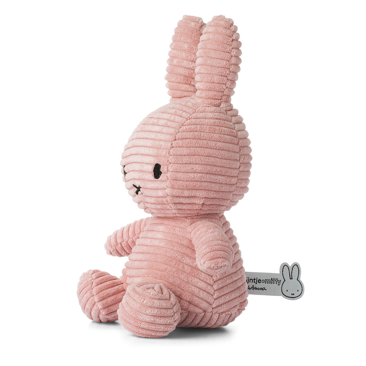 Pink corduroy Miffy bunny plush toy sitting upright.