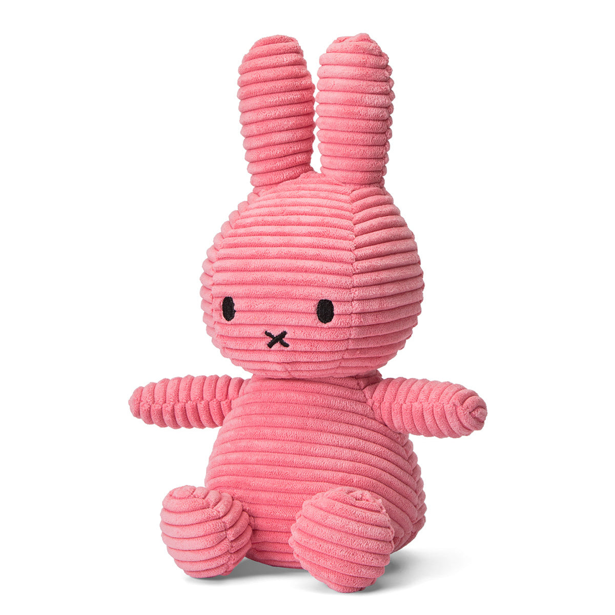 Pink corduroy bunny plush toy sitting.