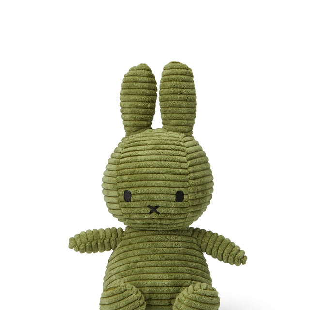 Olive green corduroy Miffy bunny plush toy sitting upright.