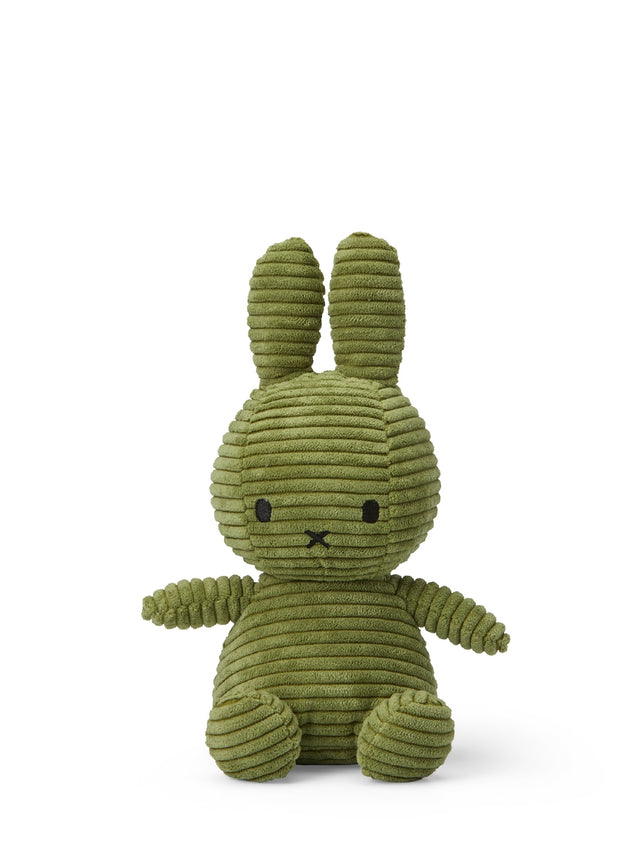 Olive green corduroy Miffy bunny plush toy sitting upright.