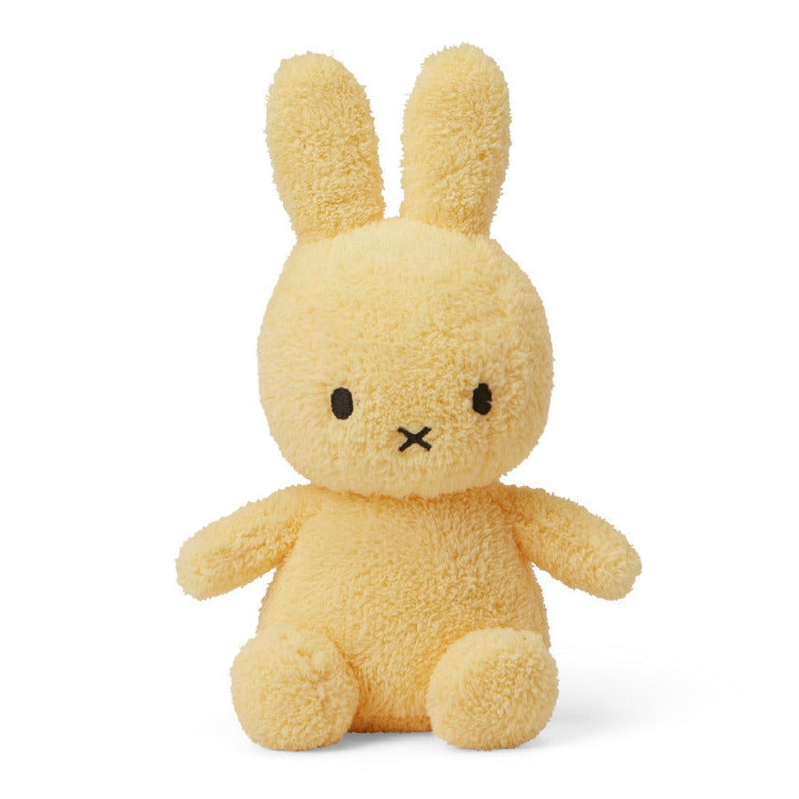 Yellow, plush Miffy rabbit toy.