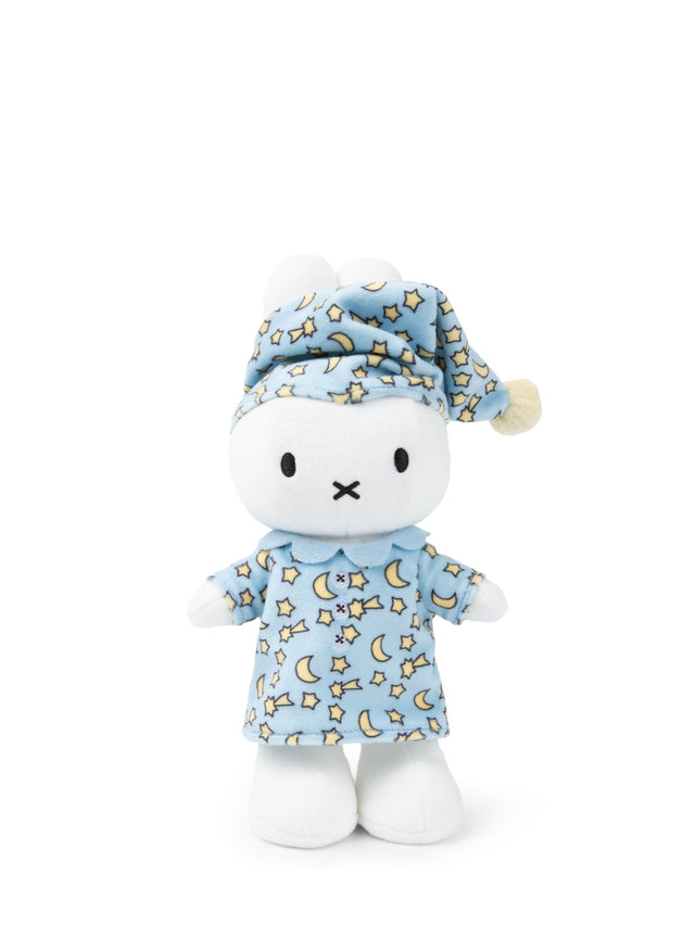 Stuffed toy with a blue nightcap and pajama set on a white background