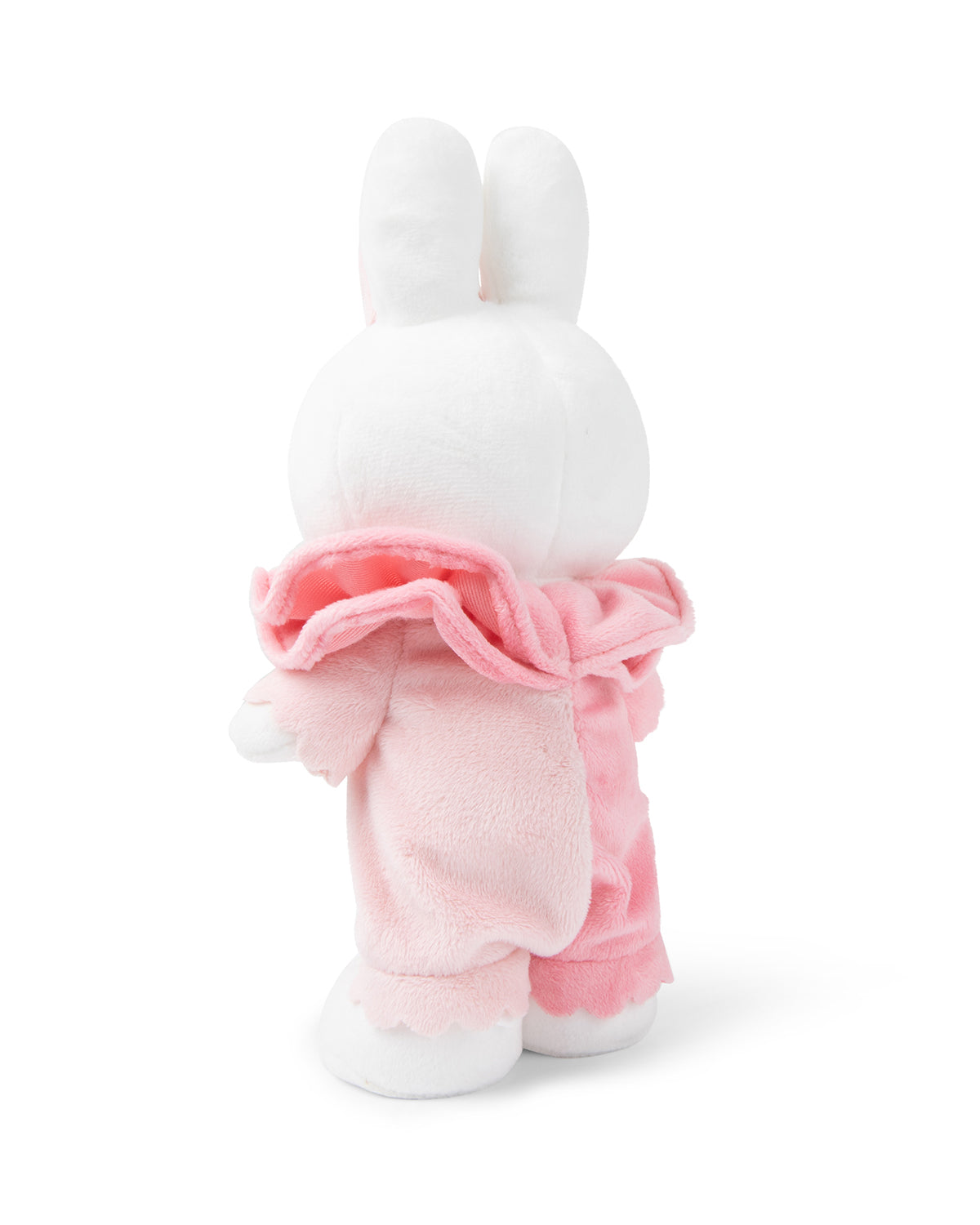White plush bunny in pink pajamas.