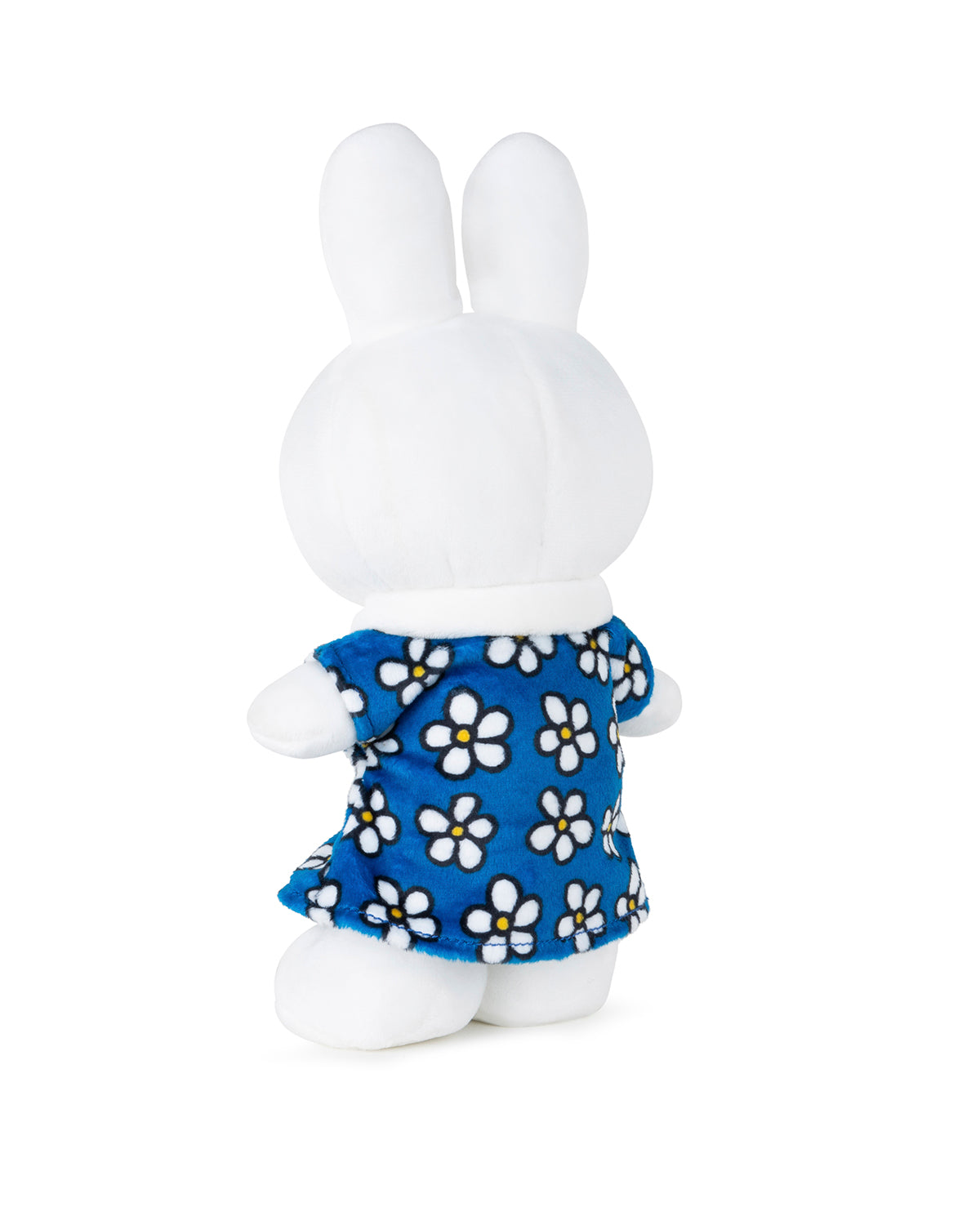 Back view of a white Miffy plush toy in a blue floral-print dress.
