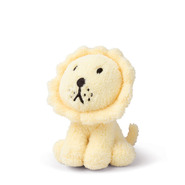 Stuffed yellow lion toy.