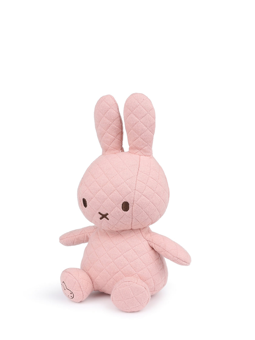 Pink plush Miffy bunny with stitched pattern, seated.