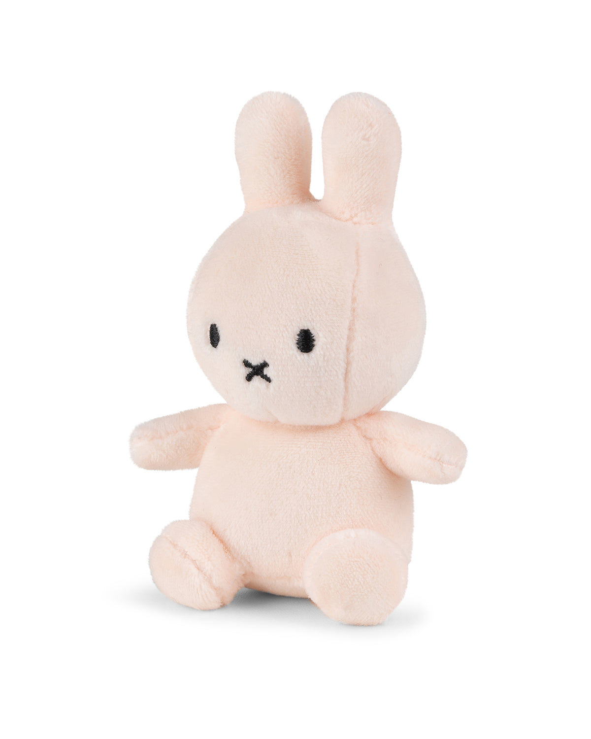 Pink Miffy plush toy sitting.