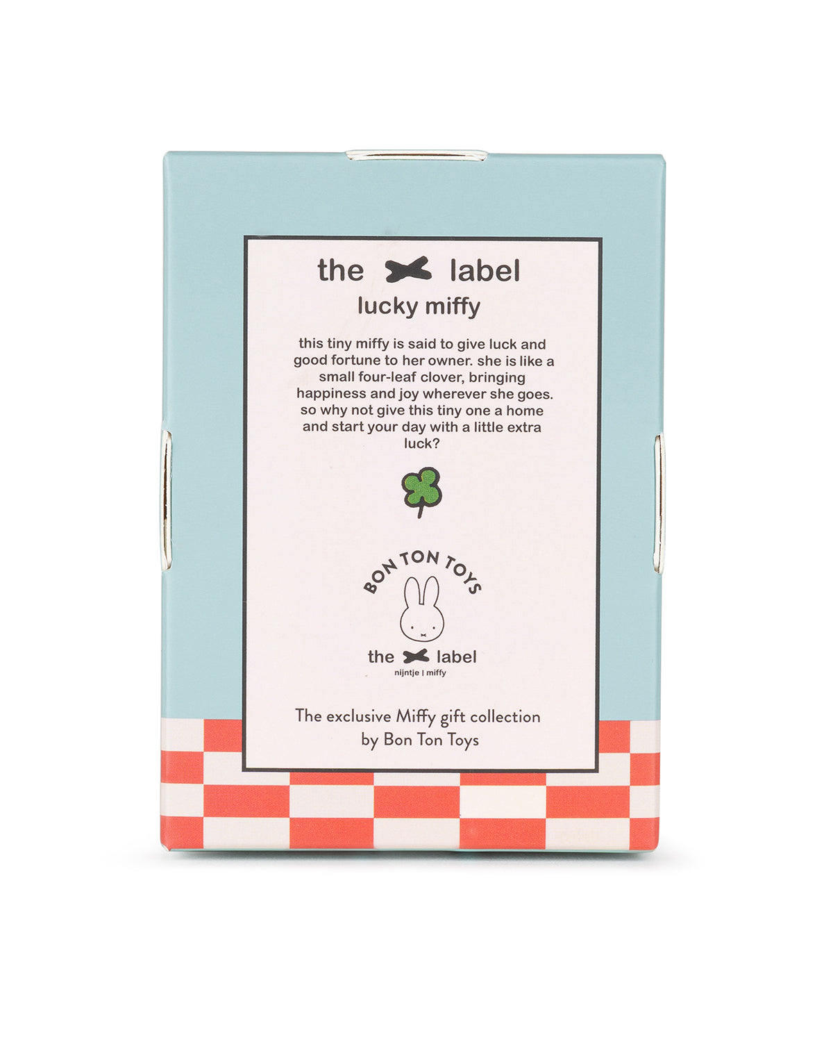 Close-up of a light blue "Lucky Miffy" box with a white label featuring text, a clover, and a Bon Ton Toys logo, all on a red and white checkered base.