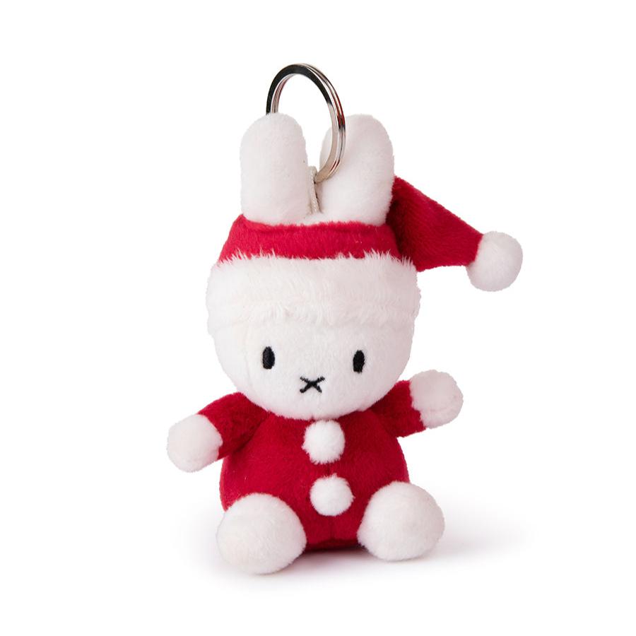 Stuffed white bunny keychain wearing a red Santa hat and suit.
