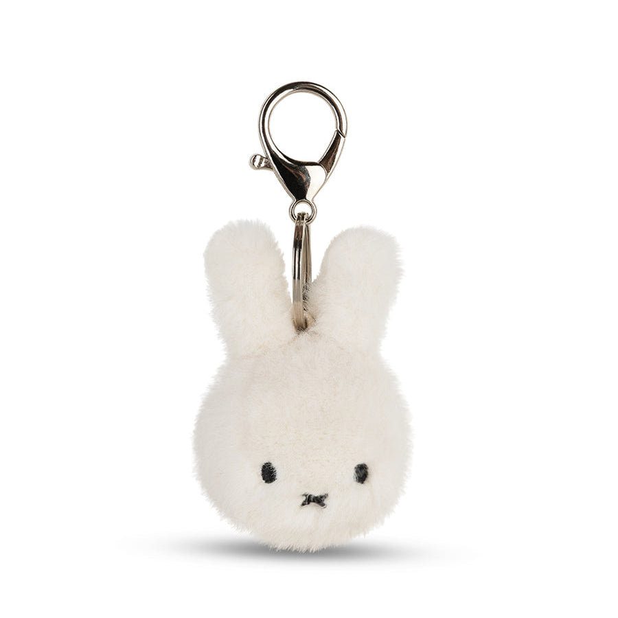 White plush bunny keychain with a clip on a white background