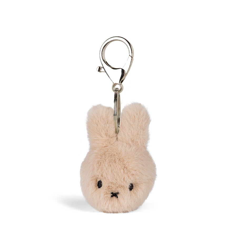 Plush bunny keychain with a clip on a white background