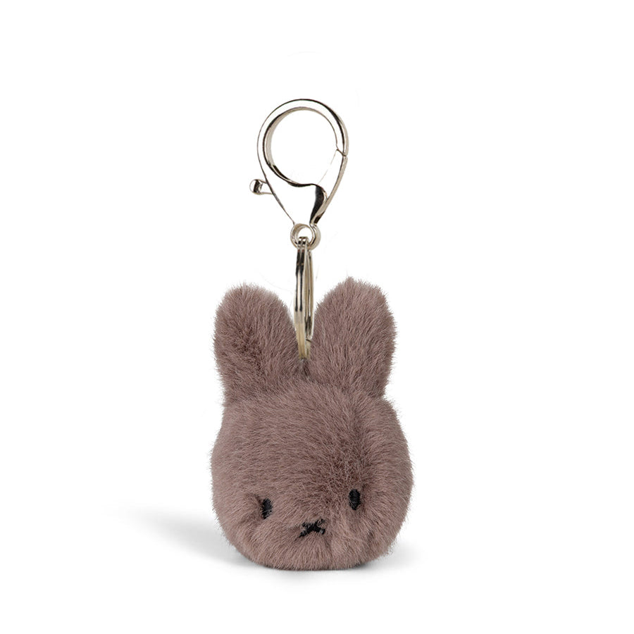 Brown bunny-shaped keychain on a white background