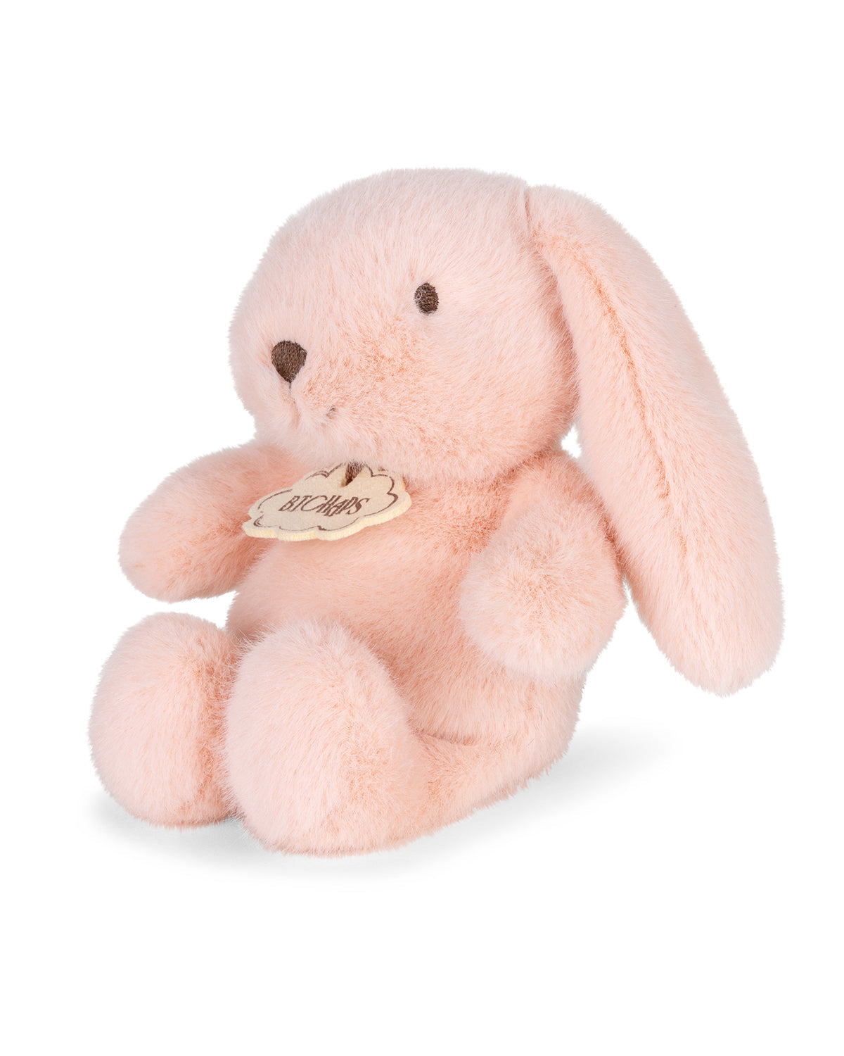 Pink plush bunny toy with a visible brand tag on a white background