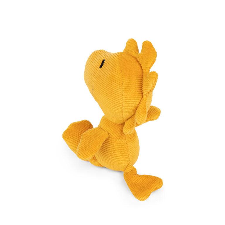 Corduroy yellow Woodstock plush toy.