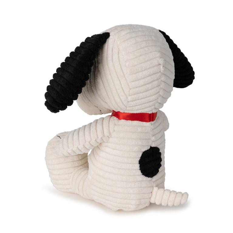 Rear view of a stuffed Snoopy toy with black ears and a red collar.