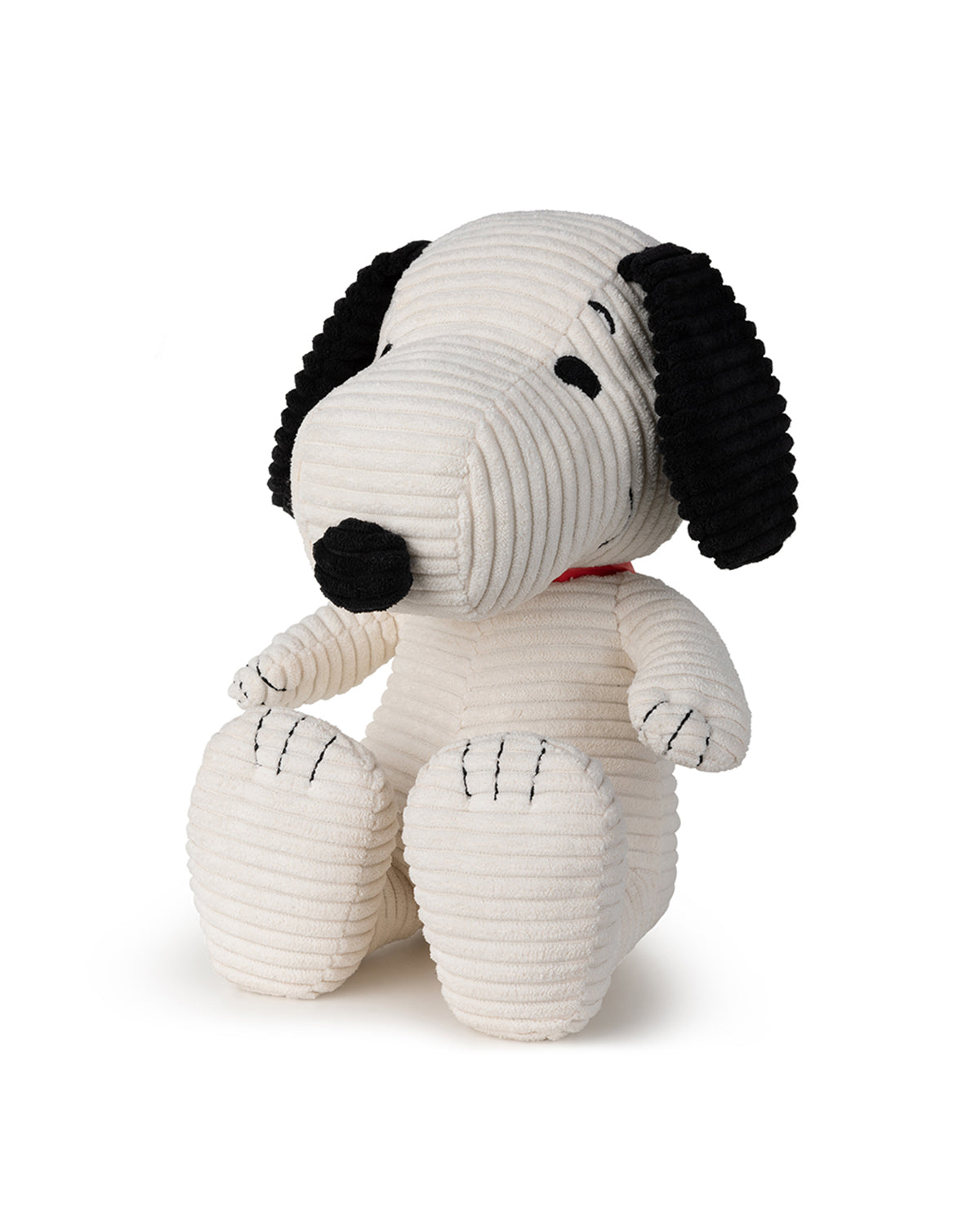 Snoopy stuffed animal with corduroy texture.