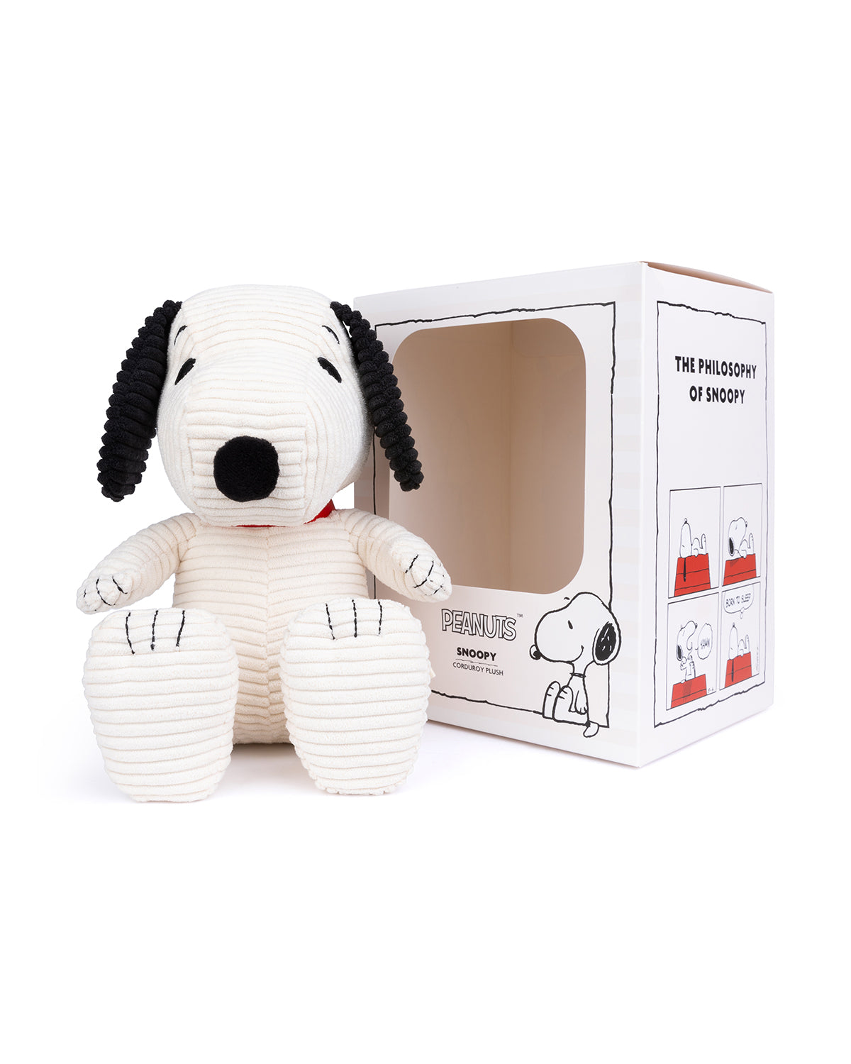 Corduroy Snoopy plush toy next to a "The Philosophy of Snoopy" box.