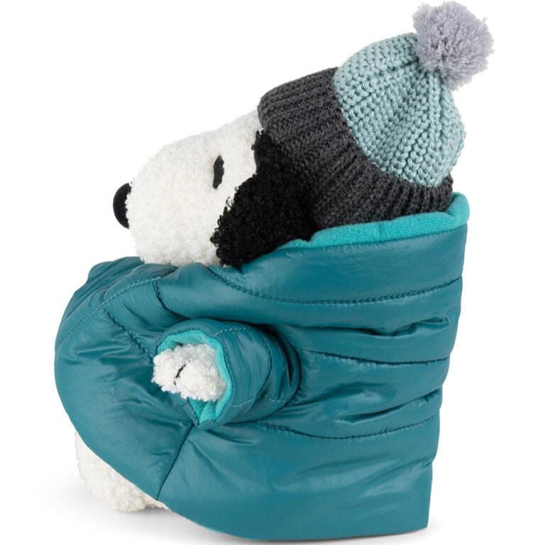 Stuffed Snoopy in blue puffer jacket and knit hat.