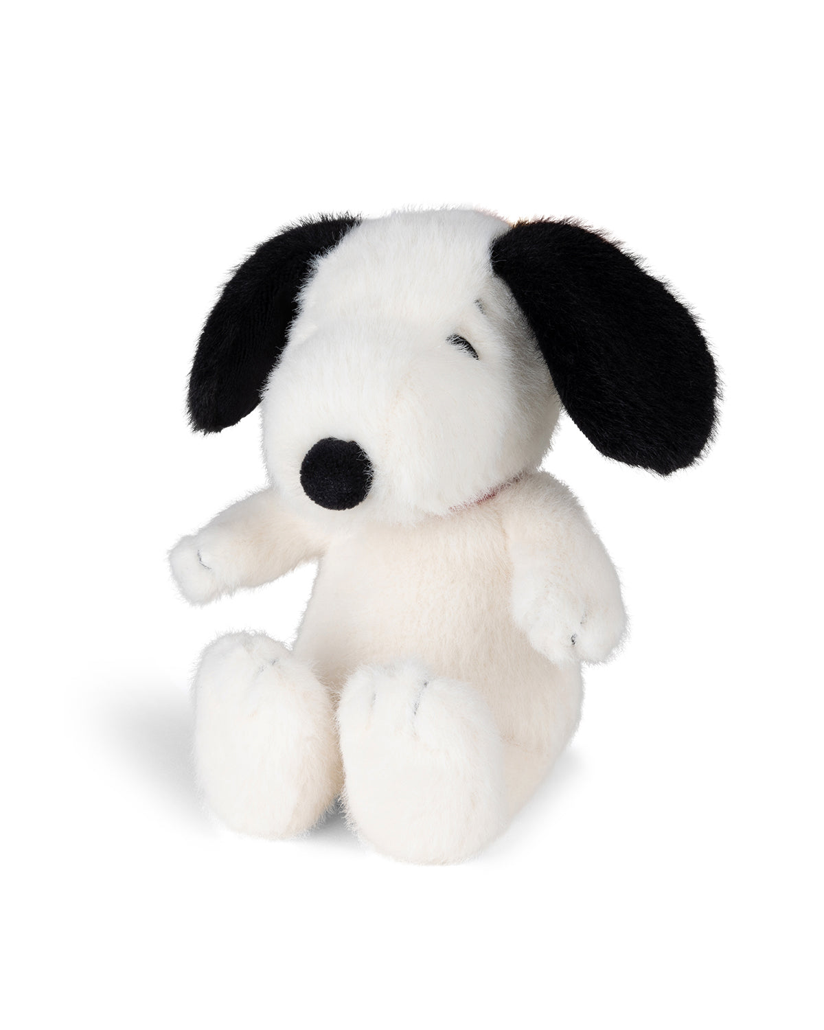 White Snoopy plush toy with black ears and nose.