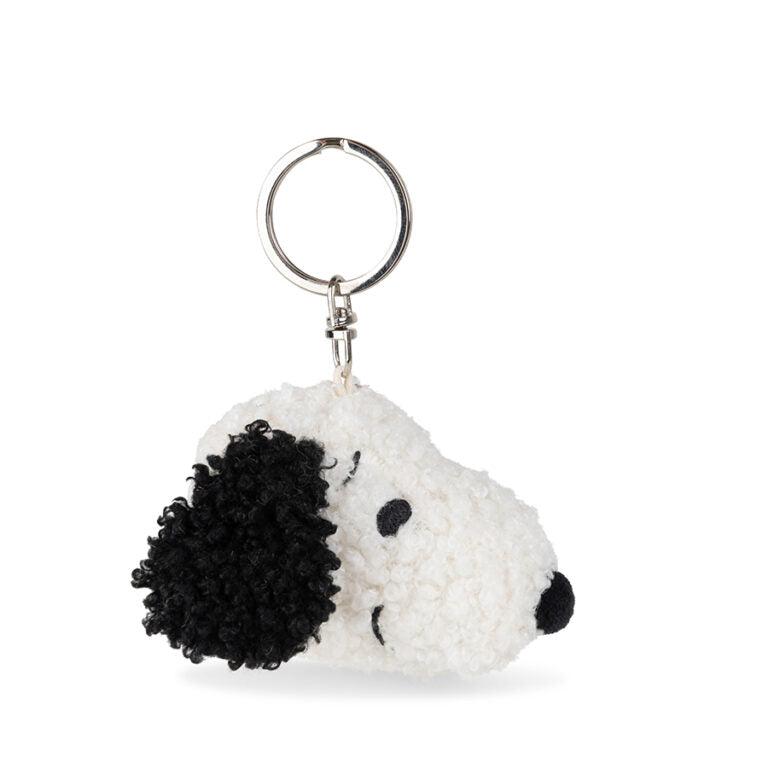 White and black Snoopy plush keychain.