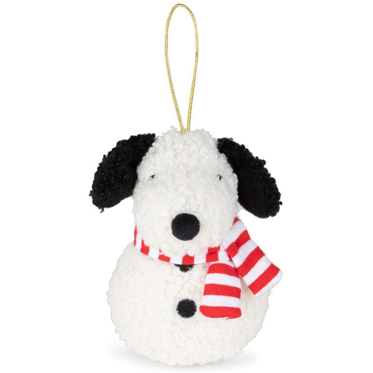 Stuffed white dog toy with black ears and a red and white striped scarf.