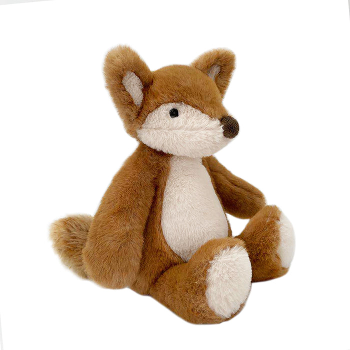 Brown and white plush fox toy sitting.