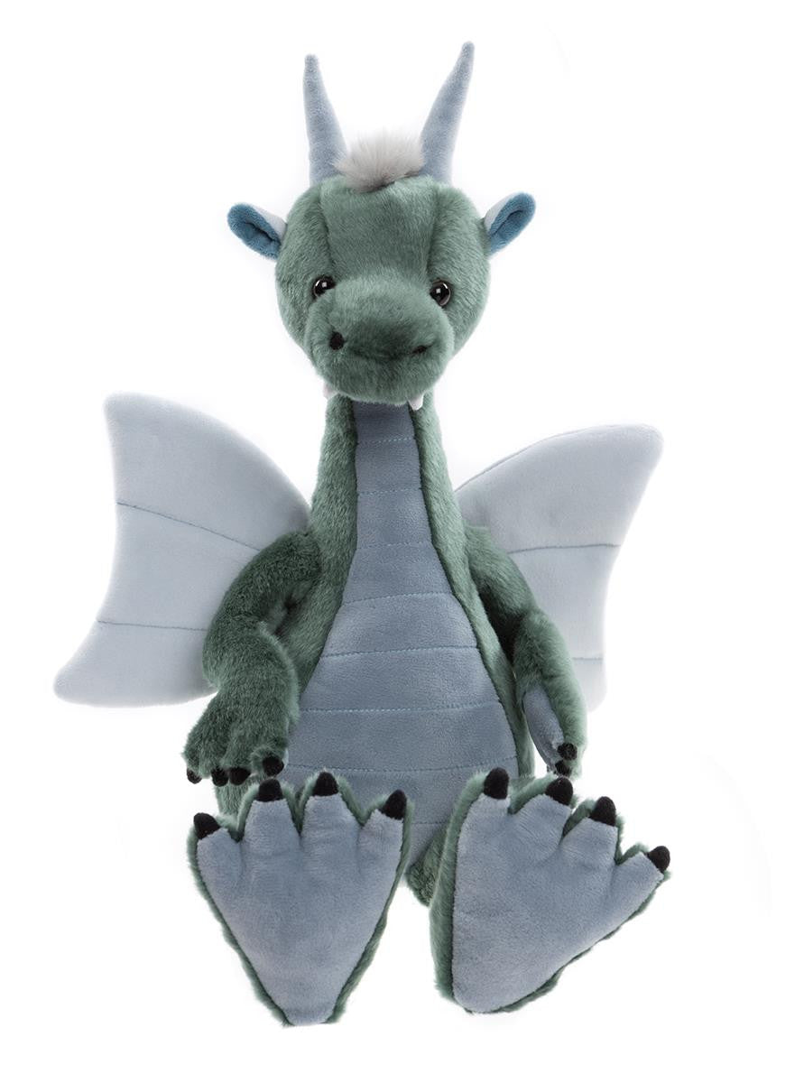 Plush dragon toy with green body and gray wings on a white background