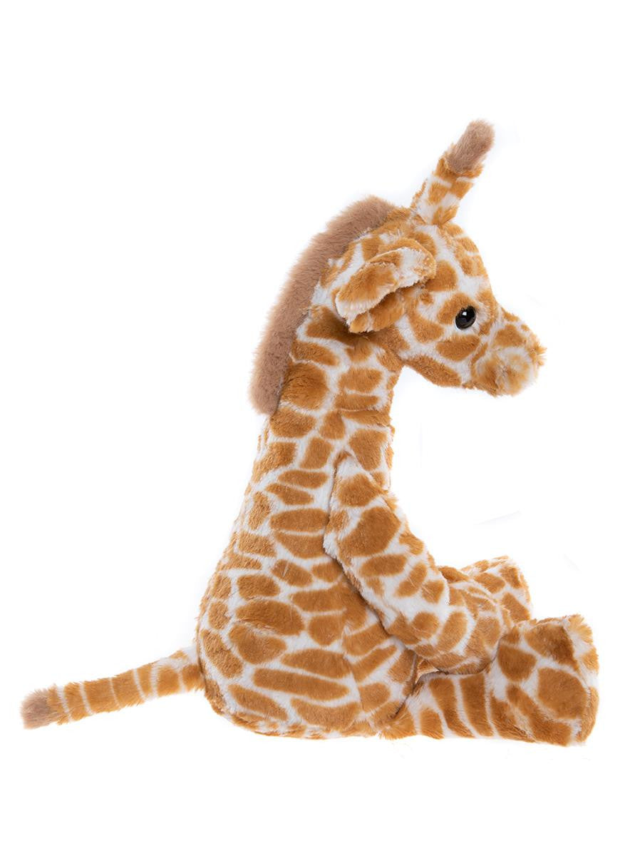 Plush giraffe toy on a white background