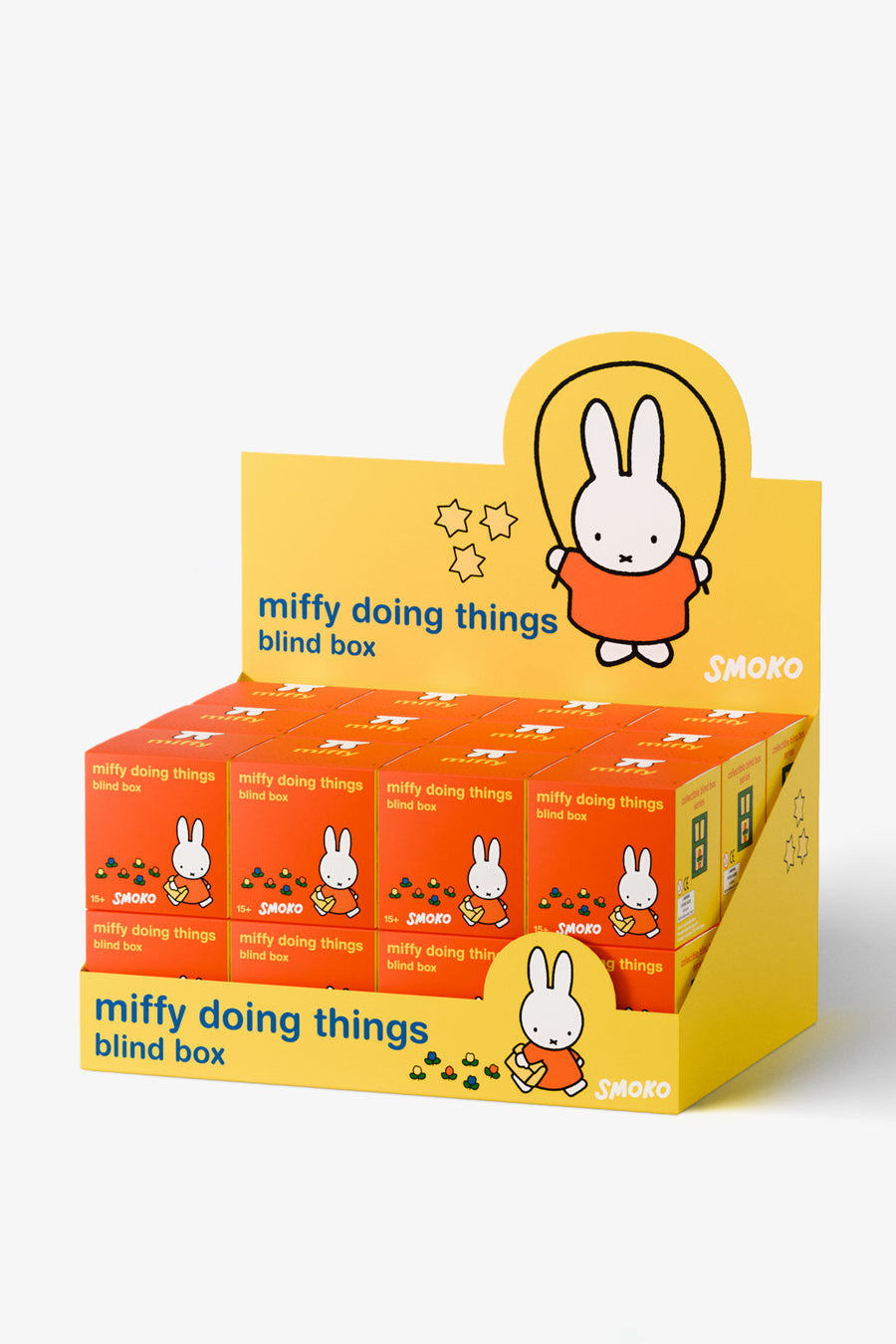 Orange and yellow blind box packaging for 'miffy doing things' by Smoko on a white background