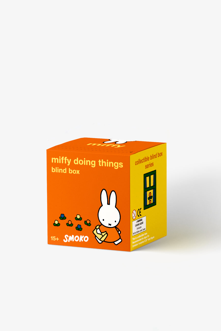 Orange and yellow blind box packaging for 'miffy doing things' by Smoko on a white background
